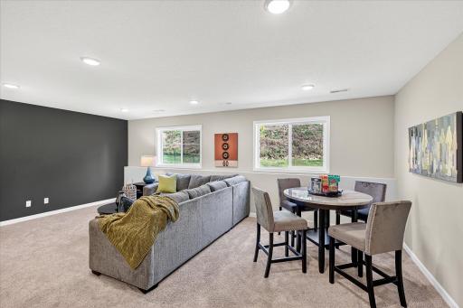 Finished Lower Level - photo is of a previous inventory home. Inquire for more details and options.