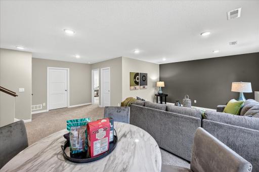 Finished Lower Level - photo is of a previous inventory home. Inquire for more details and options.