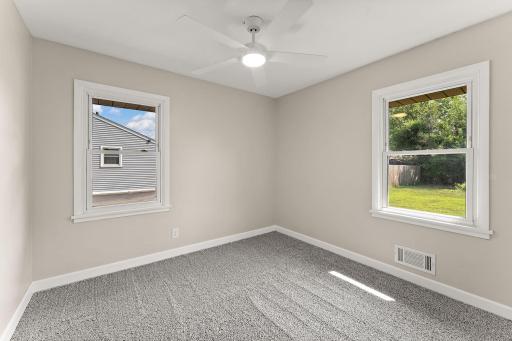 New carpet, paint, & remote ceiling fans in all 3 bedrooms