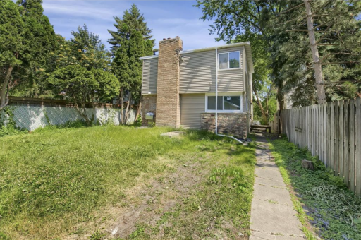 backyard and deck to the right is where the enterance to back unit is