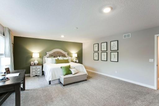 Largest primary suite that we offer! *Photo of previously built model home. Finishes and selections to vary.