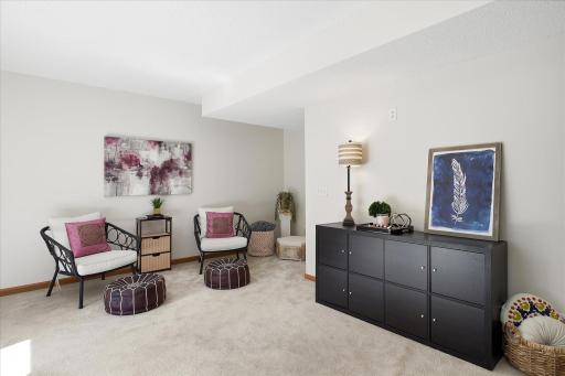 You could put game tables down here, a movie night setup, or just leave it as a great hangout space!