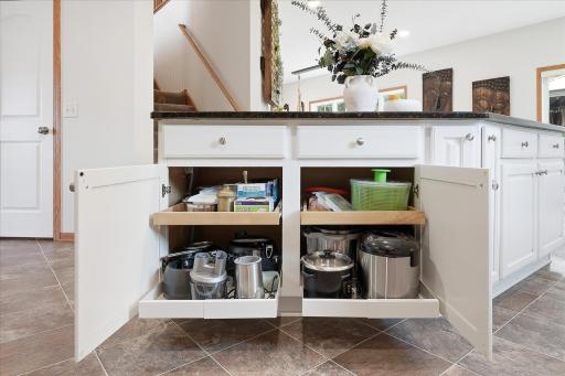 Several of the cabinets have custom pull-out shelves.