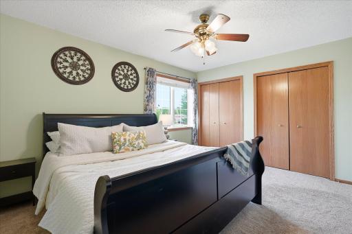 This is the other front facing bedroom on the upper level, and it has a ceiling fan!