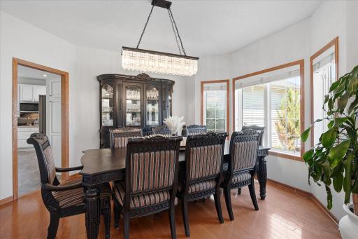 The formal dining room features a dimmable 'crystal' chandelier and plenty of space for all your favorite dining furniture!