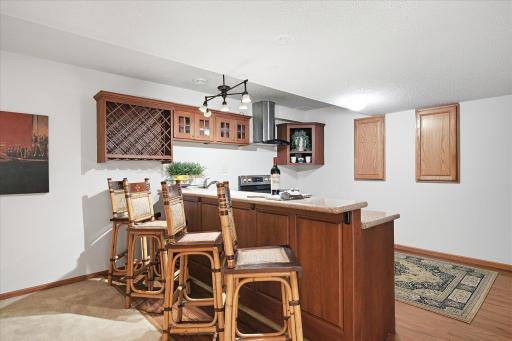 Use it as a wet bar for additional entertaining, OR if you have other people living downstairs they will have this extra space to work with!