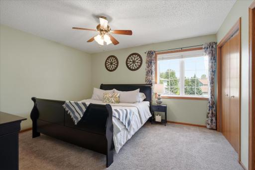 Don't miss the double bi-fold door closet and the lovely curtains!