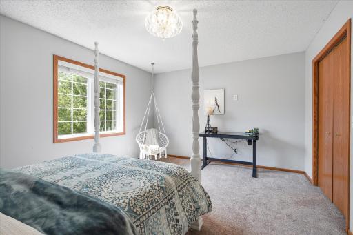 That closet is huge, and that light fixture is gorgeous!