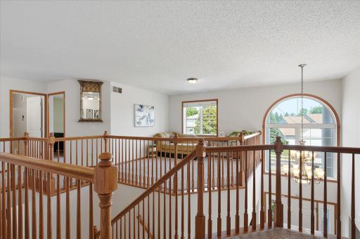 Before we head into the primary ensuite, let's look across the way for a quick glance at the loft, so we can marvel at all the fantastic natural light transfer!