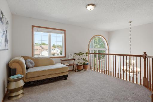 The loft space overlooks the foyer too!