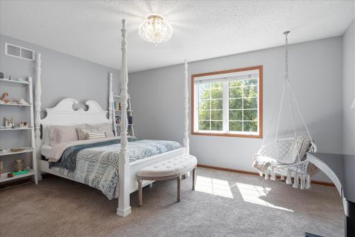 This is one of two rear facing upper level bedrooms.