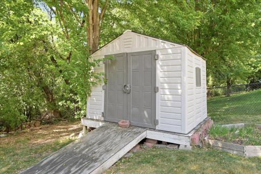 Storage shed included!