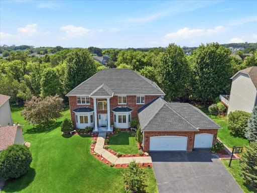 Photo for 6262 Hedgecroft Avenue S, Cottage Grove, MN 55016 - listing #7116986 Welcome to 6262 Hedgecroft! This east-facing, beautiful & stately brick front wallkout two story home boasts 6 bedrooms, 4 bathrooms, over 4700 finished square feet and it backs up to trees - not other homes!