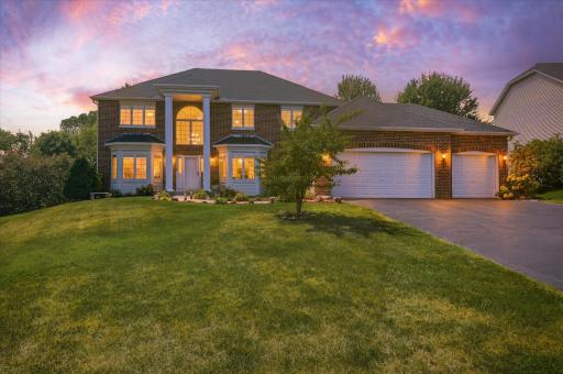 The brick front elevation is simply impressive, with low maintenance metal & vinyl accents! And the architectural roof shingles were replaced in 2017.