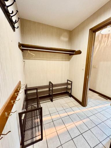Walk in closet by garage entry
