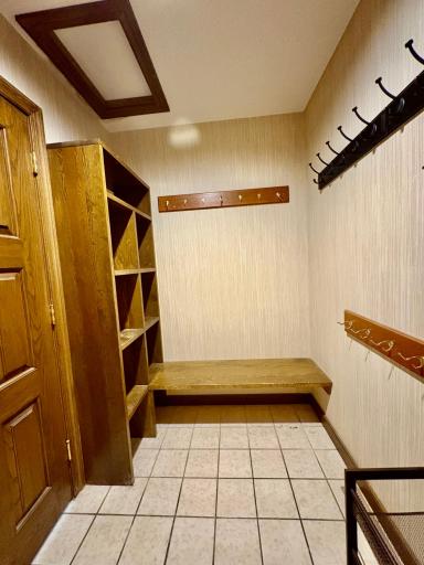 Walk in closet by garage entry