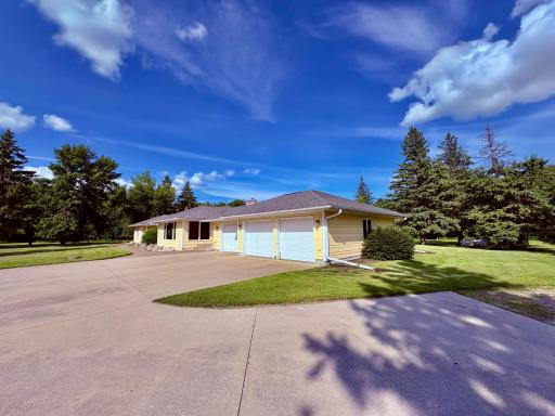 3 stall attached garage with concrete apron