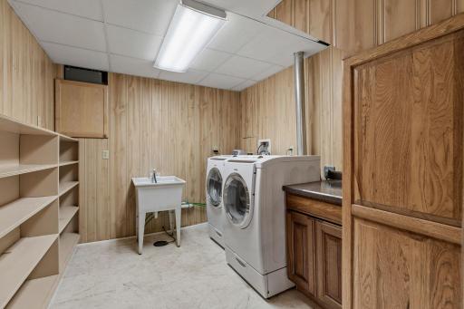 Laundry Room with Bosch front-load washer/dryer, utility sink
