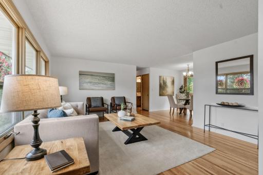 Spacious Family Room flows directly into the Kitchen + Informal Dining