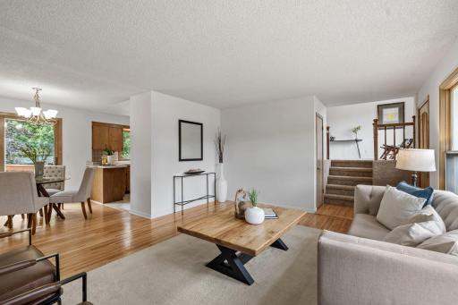Spacious Family Room flows directly into the Kitchen + Informal Dining