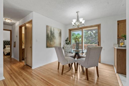 nformal Dining walks out to an oversized deck overlooking the expansive backyard