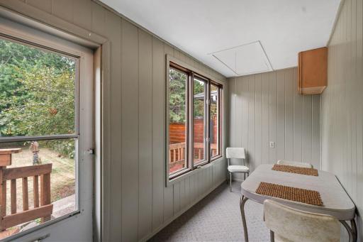 Charming 3-season porch w/ backyard access + pull-down attic storage