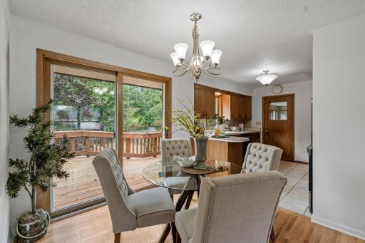 nformal Dining walks out to an oversized deck overlooking the expansive backyard
