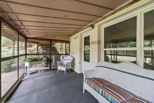 LL walk out to a screened porch overlooking amazing backyard.