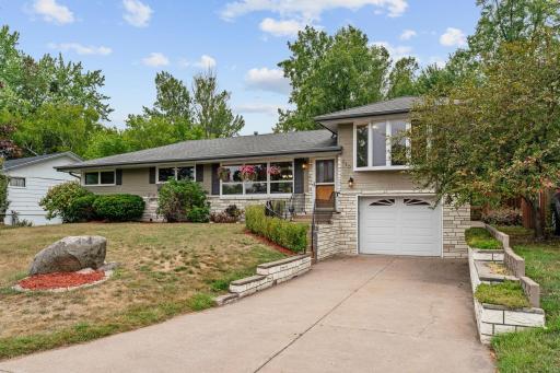 Beautifully updated 1-Level home with an incredible private backyard,