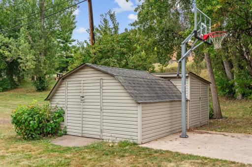 two storage sheds included