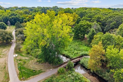 Located minutes from Hansen Park w/ tennis courts, ballfields, playground, lighted trails + 12-hole disc golf course.