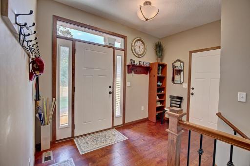 Large foyer with room for benches for guests to sit on and plenty of room for shoes and jackets!