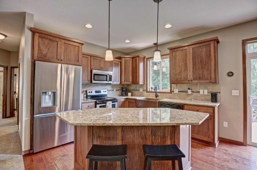 A perfect kitchen! Lots of cabinets and a large island to cultivate your culinary skill set!