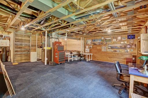 This side of the lower level has room for two additional bedrooms as well as a basement AND more storage!