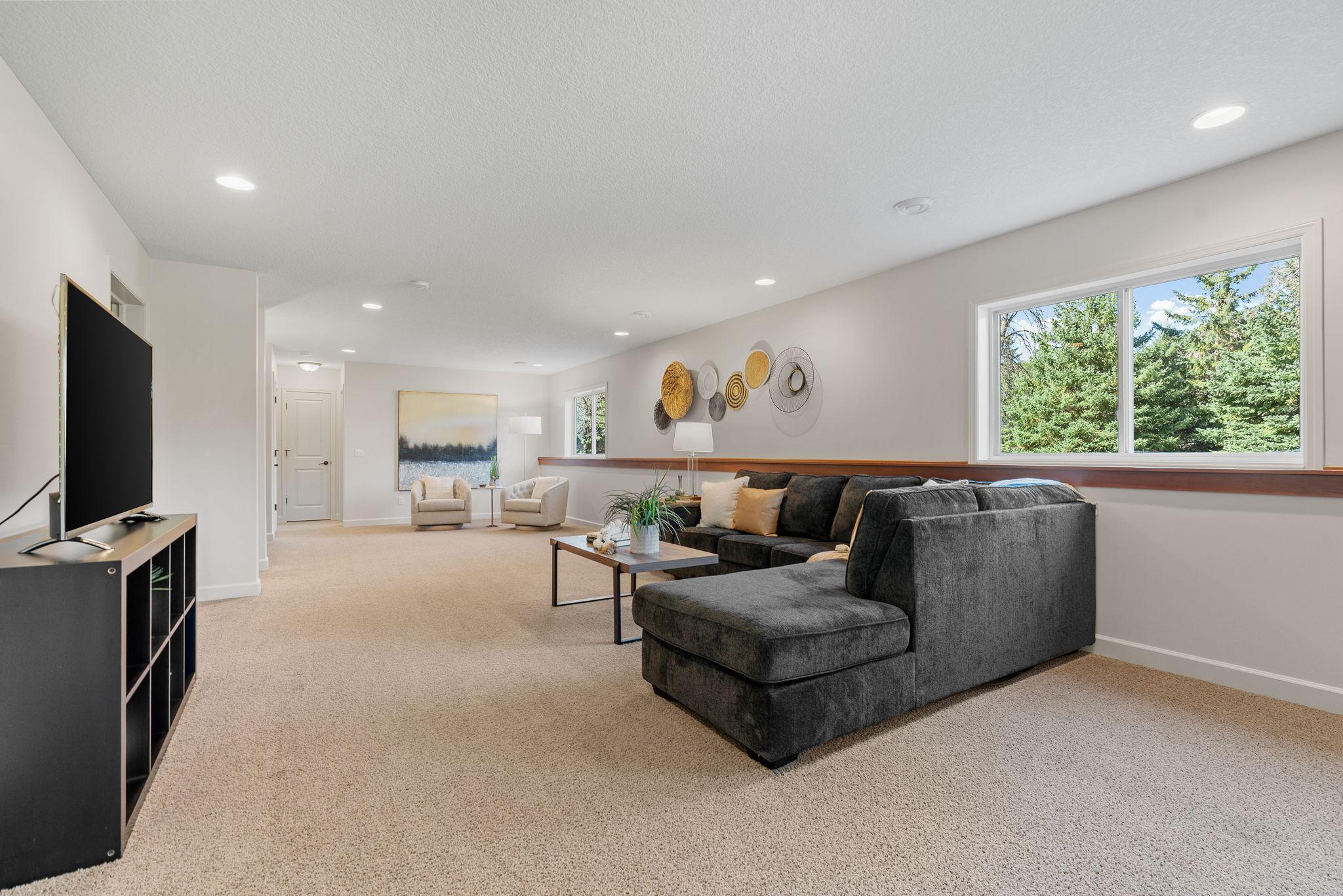 Finished LL w/ large Family Room, gaming space, 5th bedroom + bathroom