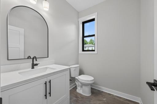 The second main level half bath closer to the mudroom area