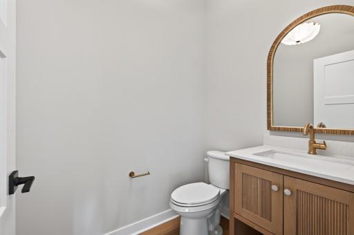 One of the two main level half baths