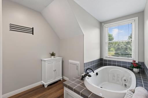 The jetted, soaking tub is spa inspired.