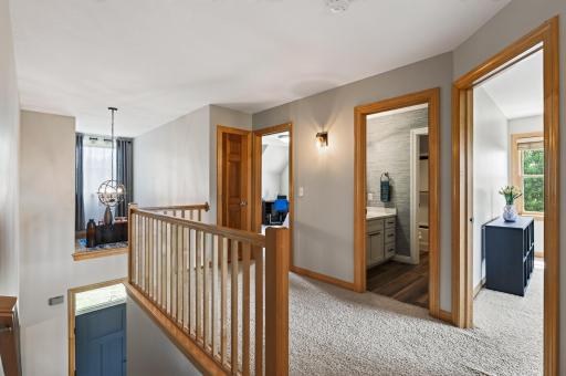 Upper level landing leads to the bedrooms and common bathroom.