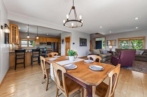 Informal dining room opens up to the kitchen and living room spaces.