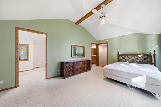 Primary bedroom suite with generous 3/4 bath and walk-in closet