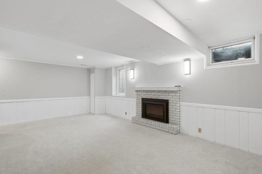 third living room with 2nd of 2 fireplaces