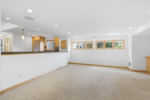 living room open concept to dining room and kitchen