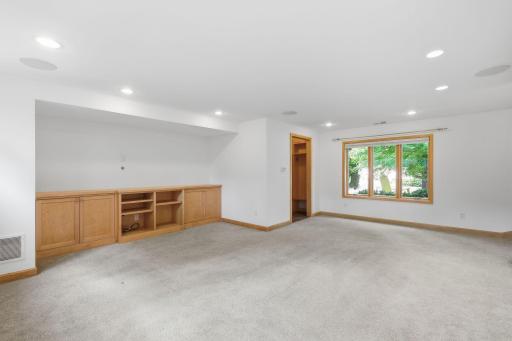 primary living room open to kitchen and dining