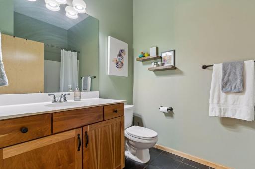 Full Bath with tile floor
