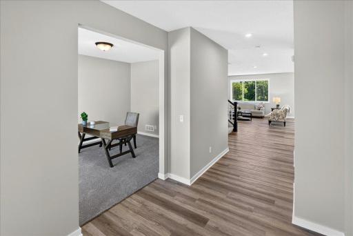 PHOTO OF A DIFFERENT HOME WITH SIMILAR PLAN AND FINISHES.
