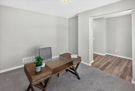 PHOTO OF A DIFFERENT HOME WITH SIMILAR PLAN AND FINISHES.