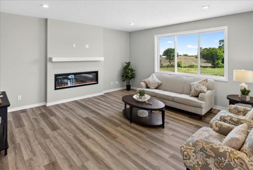 PHOTO OF A DIFFERENT HOME WITH SIMILAR PLAN AND FINISHES.