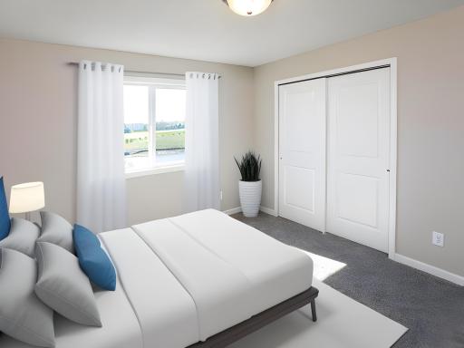 PHOTO OF A DIFFERENT HOME WITH SIMILAR PLAN AND FINISHES VIRTUALLY STAGED. Bedroom 4.
