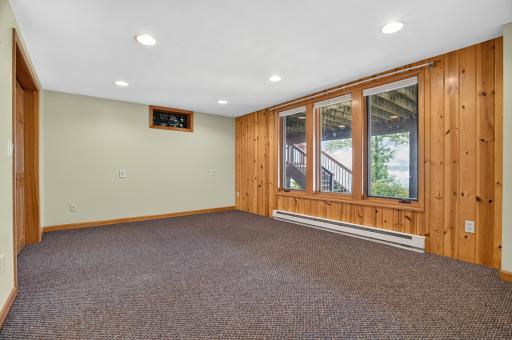 Private LL bedroom with lake views. Cement patio nearby to sit outside.